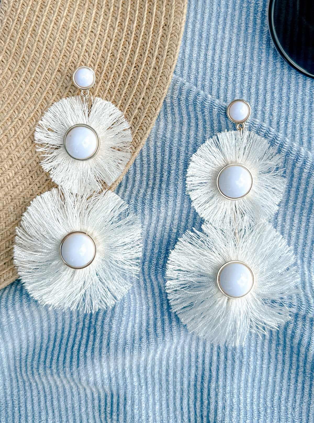 white statement earrings for summer