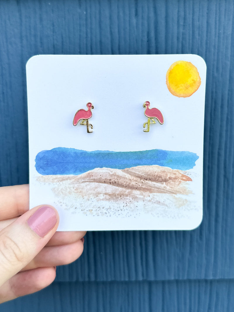 pink flamingo stud earrings on beach card