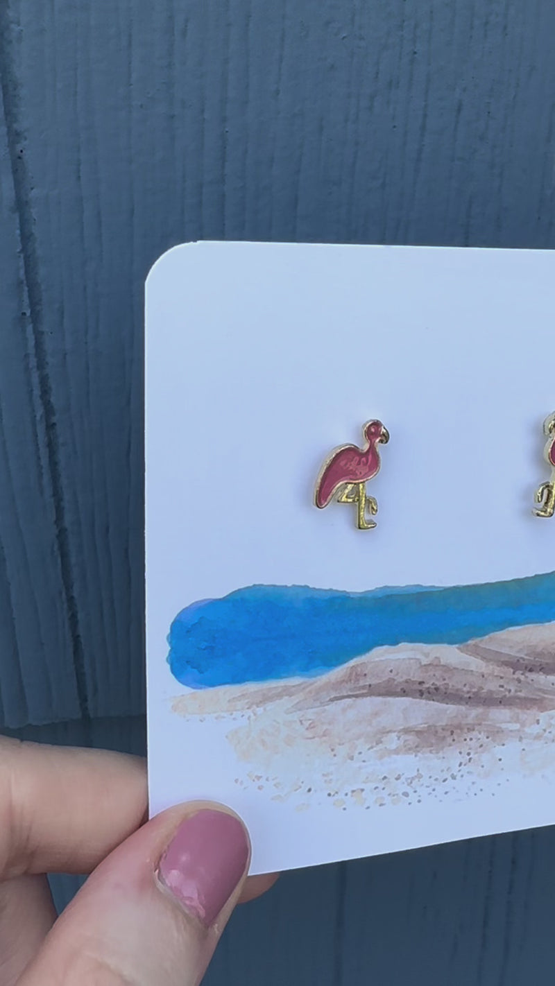 pink flamingo stud earrings on beach card