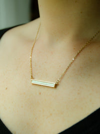 Delicate Gold Chain Necklace with Marbled Stone Bar Design