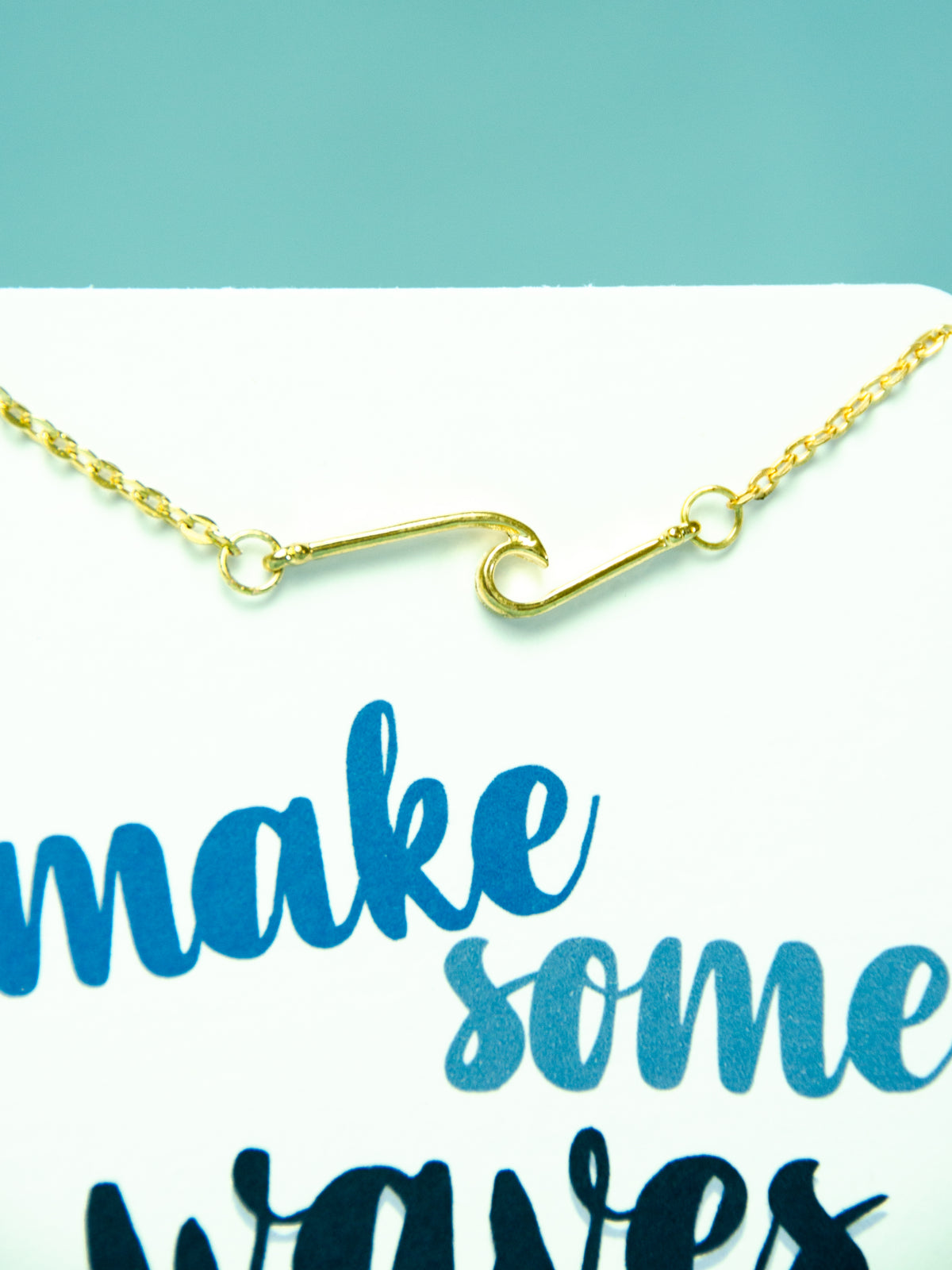 make some waves card with gold wave necklace