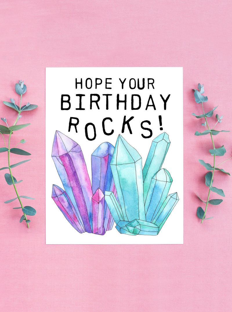greeting card with clusters of purple blue and green crystals.hope your birthday rocks greeting card