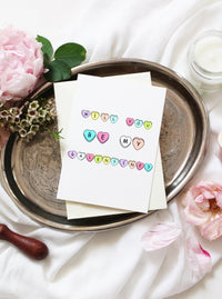 will you be my galentine? written out in colorful heart candy on white greeting card